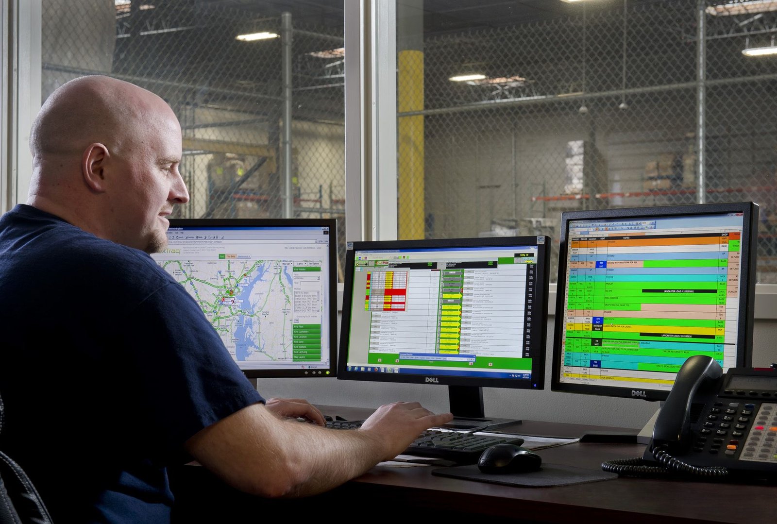 Dispatcher assigning loads from office system showing forced dispatch trucking process and control over drivers