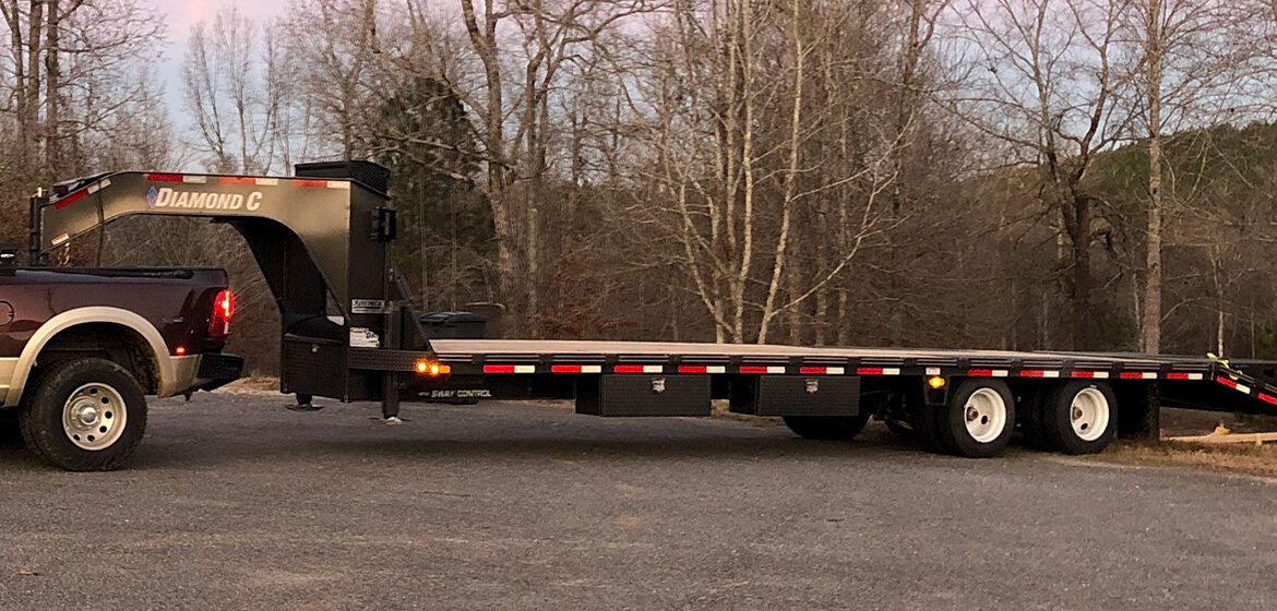 Hotshot trucking dispatch for time-sensitive freight using a pickup truck and gooseneck trailer