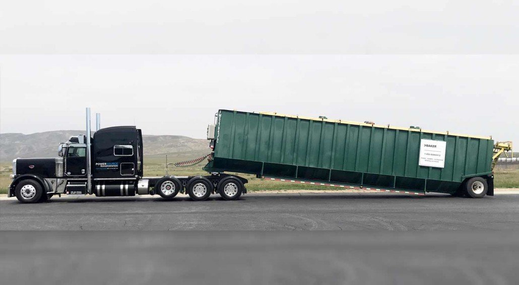 Power only dispatch truck hauling a customer-owned trailer