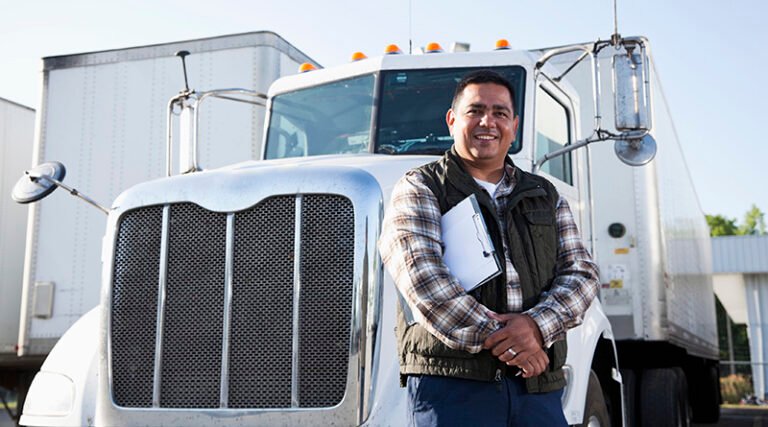 owner operator reviewing insurance requirements and trucking documents